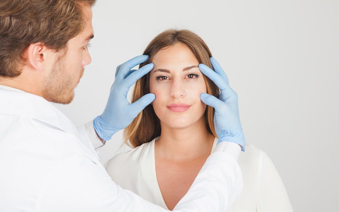 doctor holding face patient